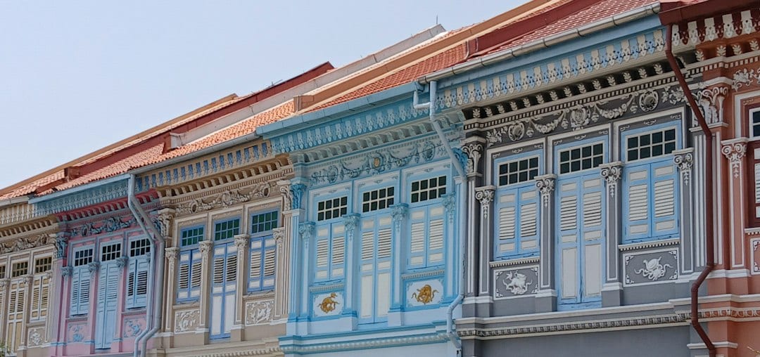 Wide street view of District 15 landed terrace homes in Singapore